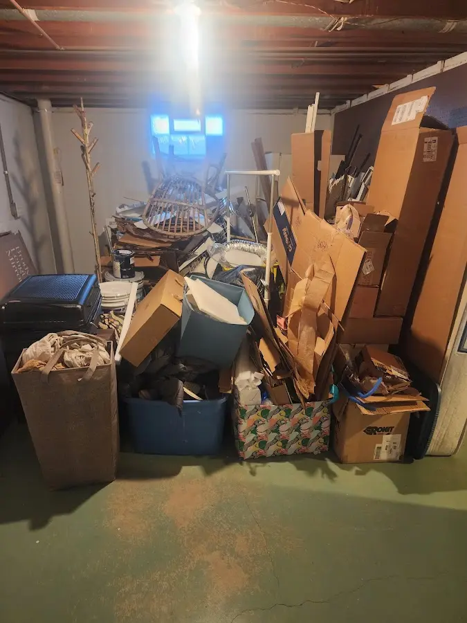 Roll-off dumpster container at job site for 2 Yard Dumpster Rental in Manhattan